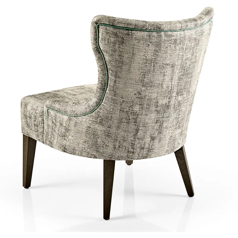 Hanna Sessel/Lounge von JMS – eleganter Loungesessel mit geschwungener Rückenlehne und grüner Ziernaht - Hantermann - Der Hotelausstatter Hanna Sessel/Lounge von JMS mit geschwungener Rückenlehne, dunklen Holzbeinen und grüner Ziernaht für Hotel und Lounge