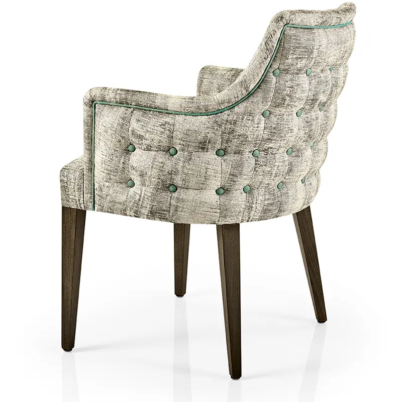 Hanna Sessel/Lounge von JMS – eleganter Loungesessel mit grüner Knopfheftung und umlaufendem Keder - Hantermann - Der Hotelausstatter Hanna Sessel/Lounge von JMS mit grüner Knopfheftung, Keder, Armlehnen und dunklen Holzbeinen für Hotel und Gastronomie
