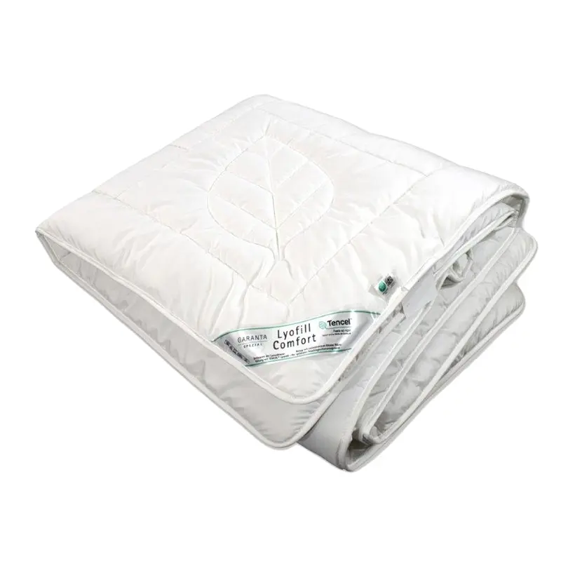Lyofil Comfort Duo Bettdecke mit TENCEL™ – nachhaltige Winterdecke für hohen Wärmebedarf - Hantermann - Der Hotelausstatter Zusammengelegte Lyofil Comfort Duo Bettdecke mit TENCEL™ für nachhaltigen Schlafkomfort in kalten Nächten